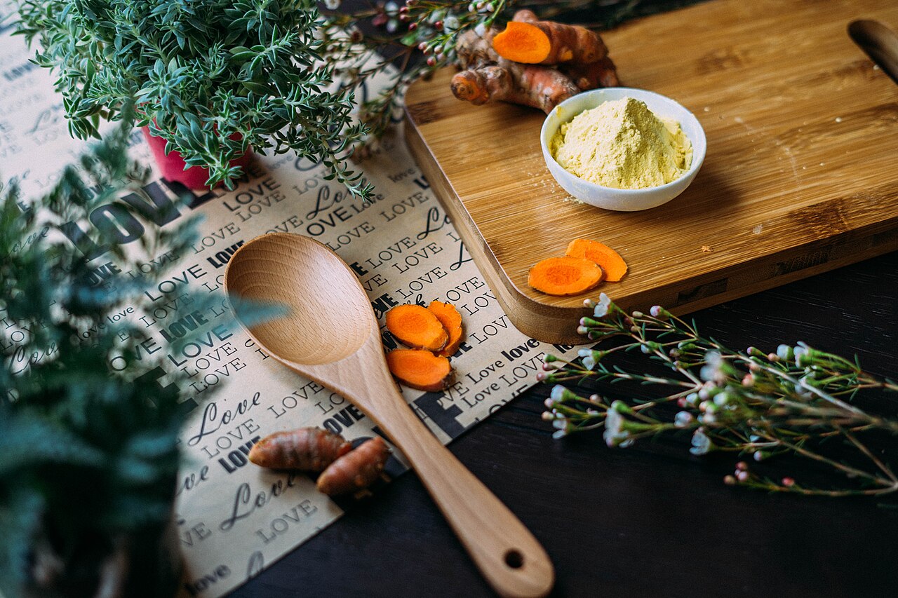Fresh turmeric and Thai medicinal herbs — the foundation of the project